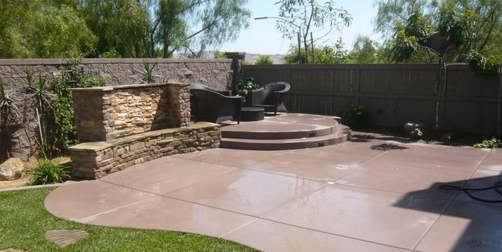 how to design a Backyard Concrete Patio Design with fire pit